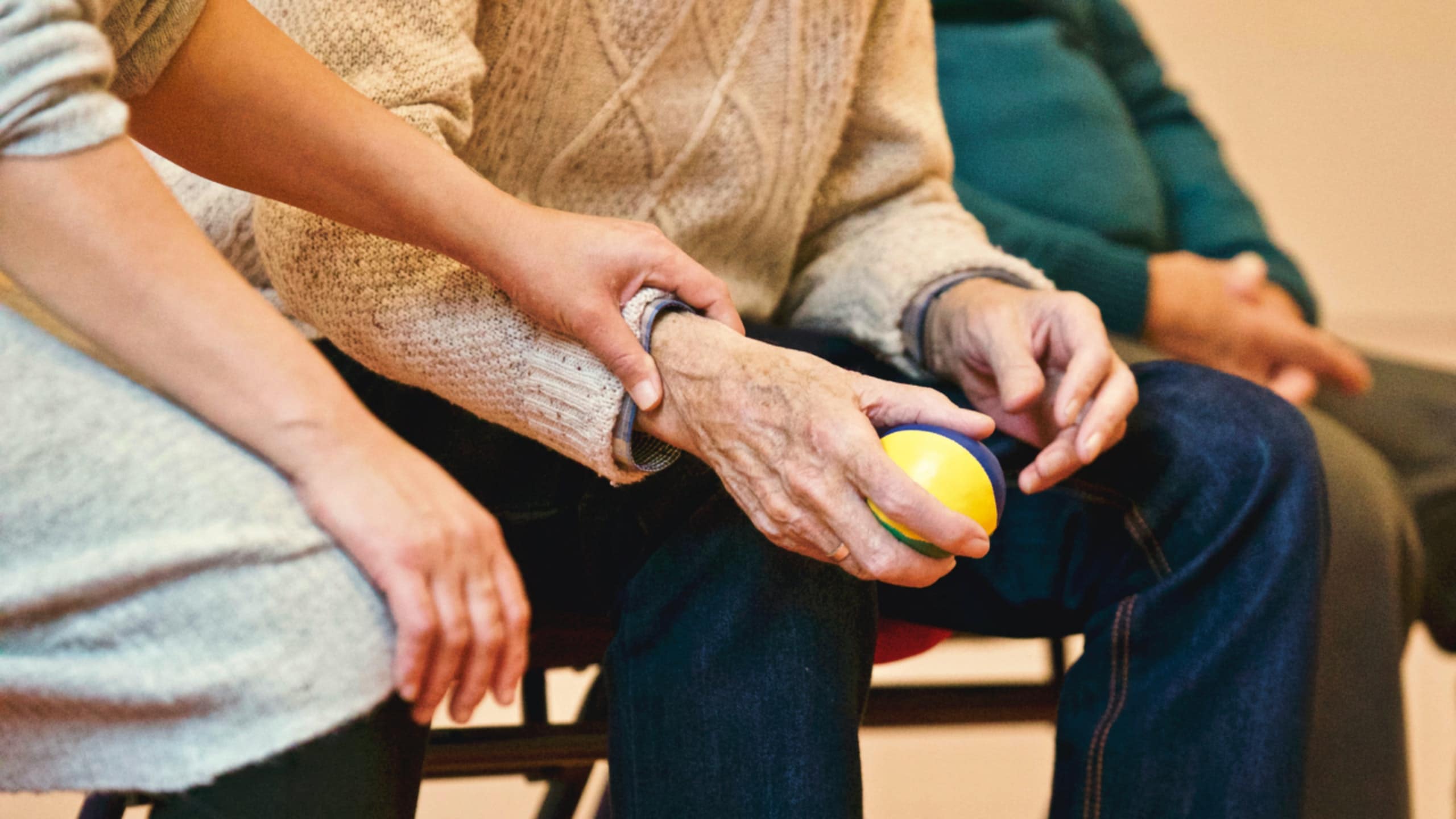 Man holding ball Parkinson's and CBD