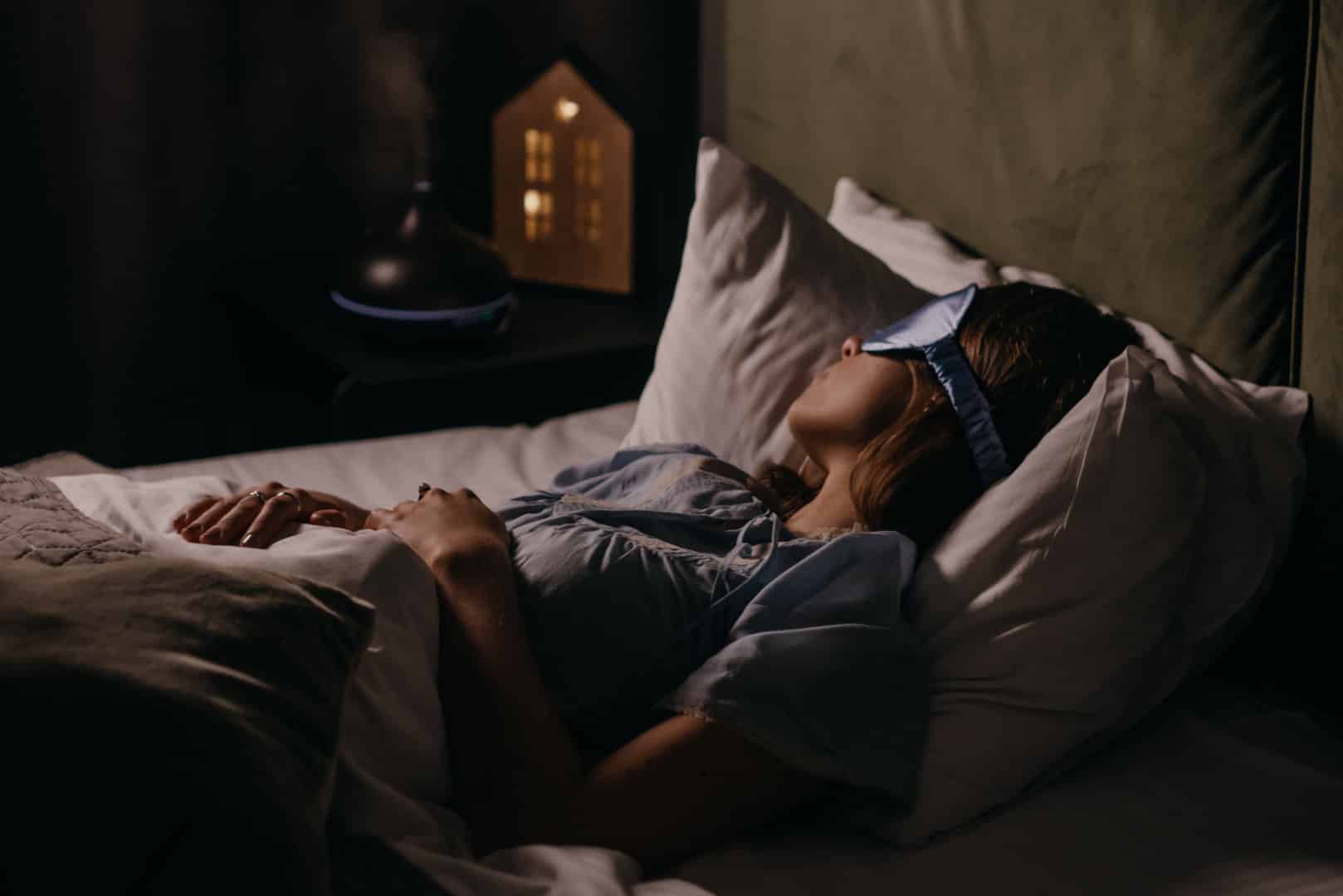 Woman with sleep mask sleeping