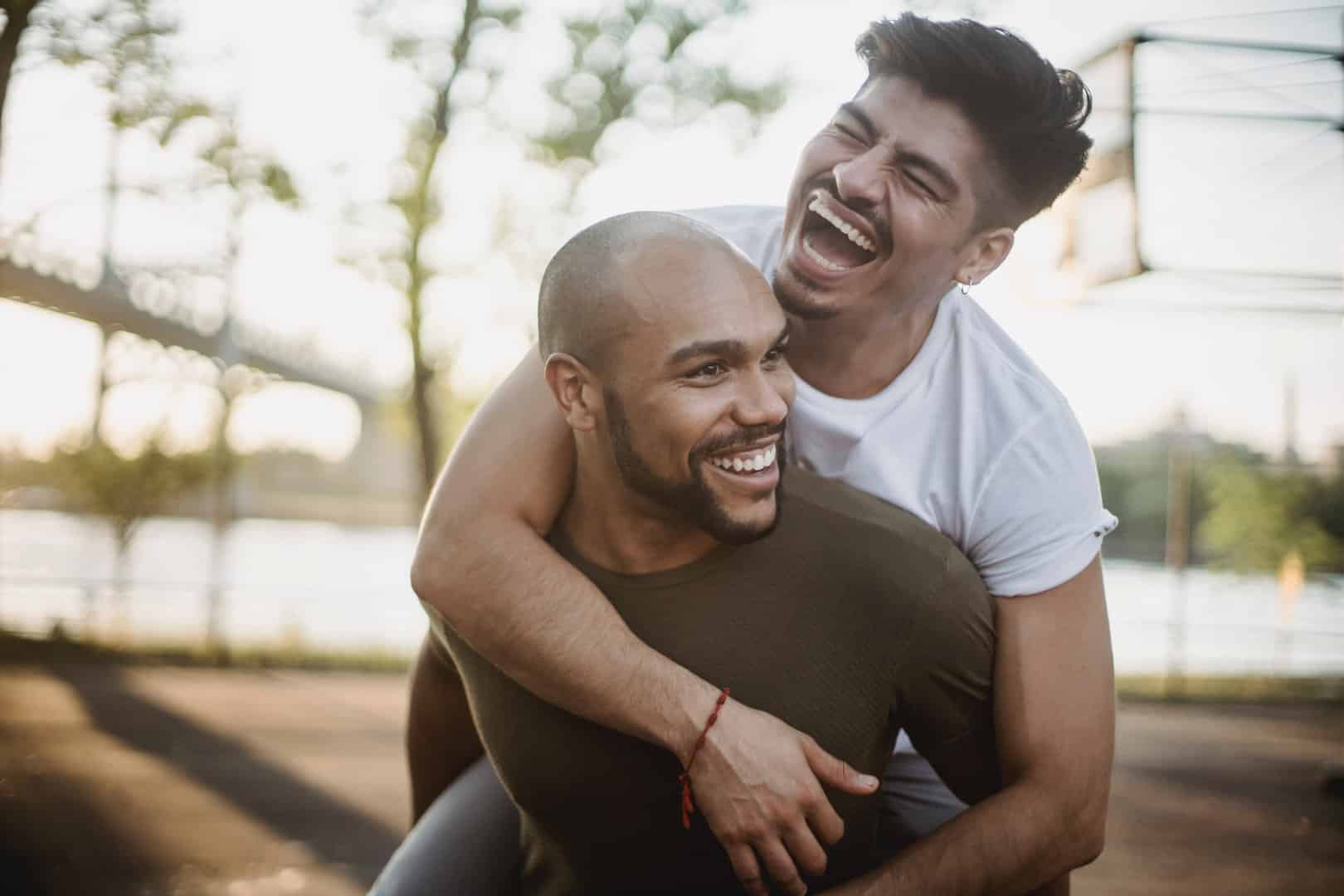 Couple holding each other being happy and laughing